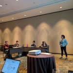 An undergraduate student from the workshop team contributing to a workshop session at the AAPT 2024 Summer Conference.