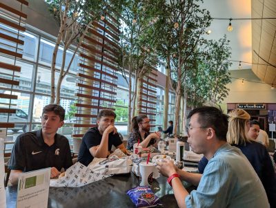Workshop team enjoying lunch together during a break at the AAPT 2024 Summer Conference.